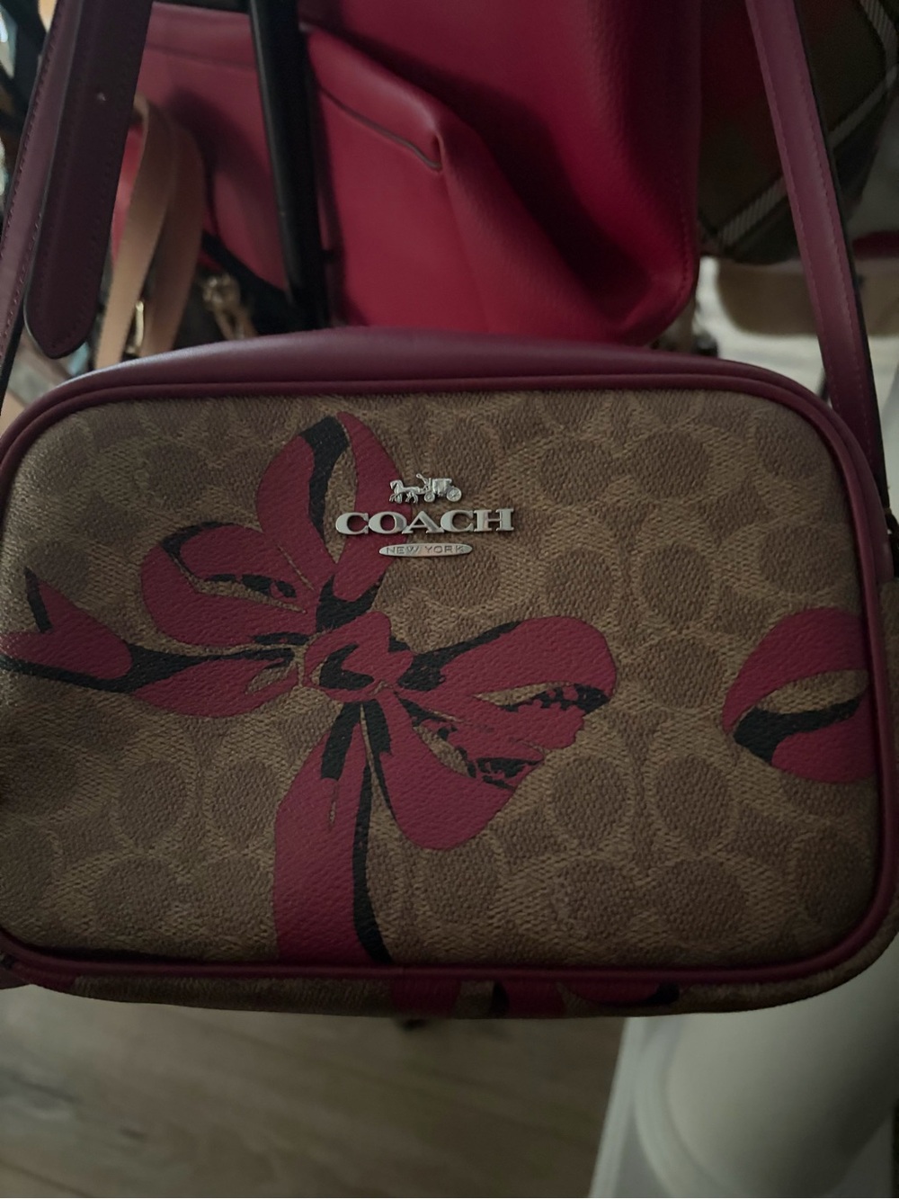 COACH Brown Signature Bow Crossbody